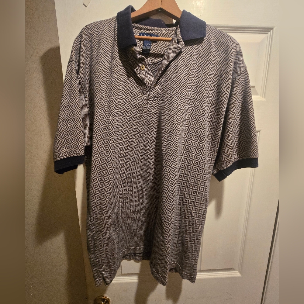 Izod Navy and White Patterned Polo Shirt, Perfect For Golf Or Casual Outing